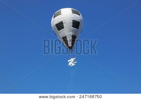 Hot Air Balloon Isolated On Beautiful Sky