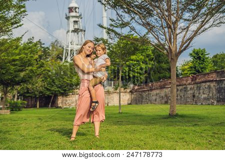 Mom And Son On Background Of Fort Cornwallis In Georgetown, Penang, Is A Star Fort Built By The Brit
