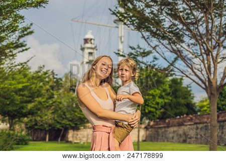 Mom And Son On Background Of Fort Cornwallis In Georgetown, Penang, Is A Star Fort Built By The Brit
