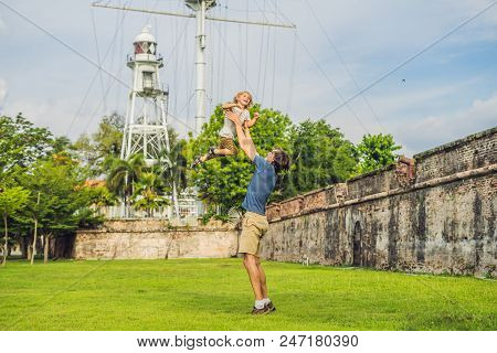 Dad And Son On Background Of Fort Cornwallis In Georgetown, Penang, Is A Star Fort Built By The Brit