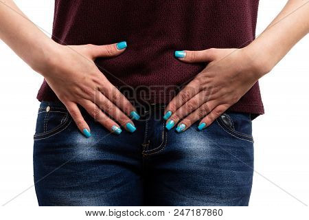 Close-up Of Female Suffering Menstrual Pain In Lower Abdomen.