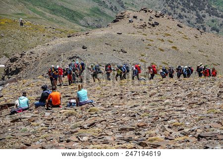 Sierra Nevada, Spain - June 23, 2018: Unidentified Large Group Of Mountaineers Ascend To Mulhacen Pe