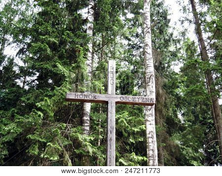 Wooden Cross In Poland With Writing 