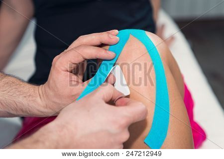 Female With Kinesiotape On Shoulder, Toned Image