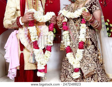 The Bride And Groom At The Indian Wedding Garlands Or Jaimala Ceremony