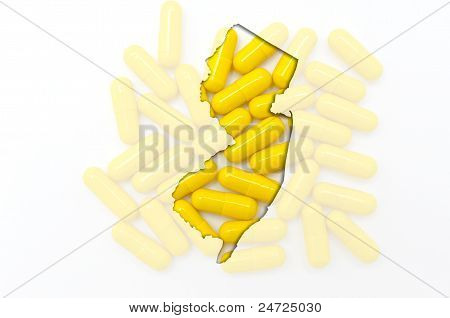 Kontur kort over New Jersey med gennemsigtig piller i baggrunden
