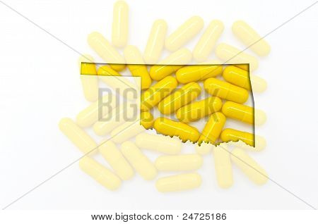 Kontur kort over Oklahoma med gennemsigtig piller i baggrunden