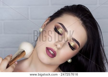 Beautiful Brunette With Professional Make-up