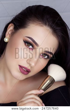 Beautiful Brunette With Professional Make-up