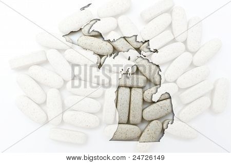 Kontur kort over Michigan med gennemsigtig piller i baggrunden