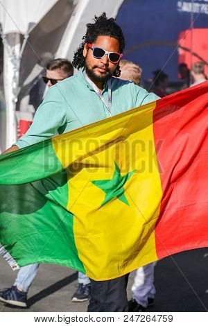 St. Petersburg, Russia - June 26, 2018: Supporter Man Of Senegal National Football Team, Nicknamed L