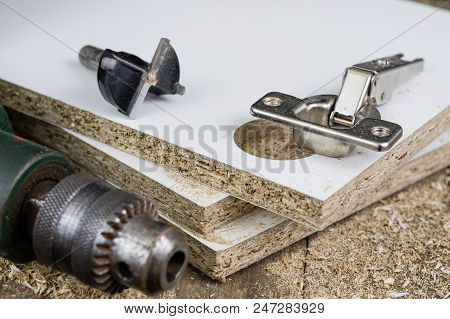 Milling Cutter For Fixing Hinges In Chipboard. Joinery Accessories For Furniture Construction.