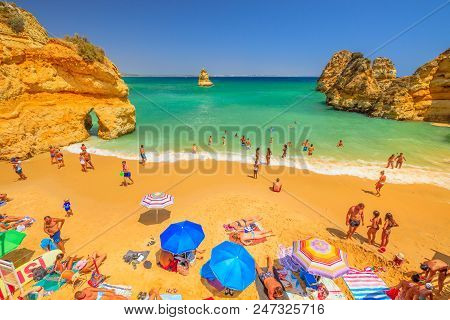 Lagos, Portugal - August 21, 2017:aerial View Of People Sunbathing On Popular Praia Do Camilo Beach 