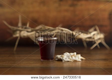 Christian Communion On A Wooden Table With A Crown Of Thorns