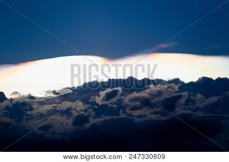 Cloud Iridescence, Diffraction Phenomenon Produce Very Vivid Color And Make Cloud Shine Like A Coron