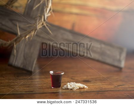 Christian Communion On A Wooden Table With A Cross
