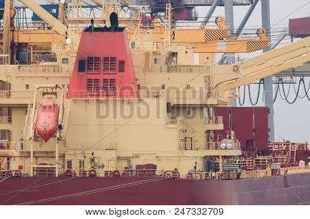 Merchant Vessel - Transhipment Of A Freighter At The Quay In Swinoujscie