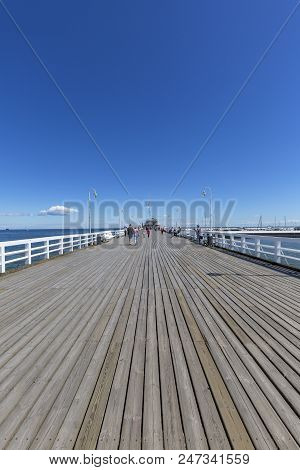 Sopot, Poland - June 6, 2018: Wooden Sopot Pier In Sunny Day. It Is The Longest Wooden Pier In Europ