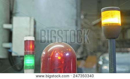 Warning Light On A Processing Machine. Closeup Flashing Red Lamp On Machine In Toilet Paper Producti