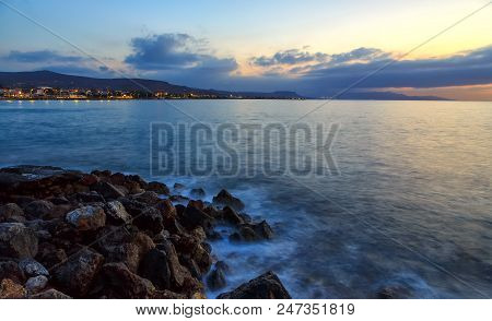 Beautiful Mysterious Marine Landscape At Sunset. Volcanic Reef And Ocean, Iseland Crete