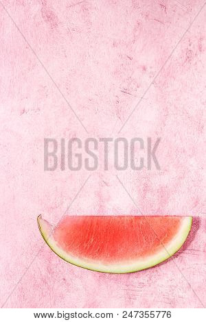 Ripe Slice Of Watermelon Without Ossicles Over Pink Texture Background. Flat Lay, Space.