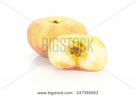 One Fresh Ripe Saturn Peach With One Half Isolated On White Background