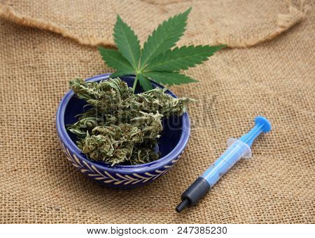 Phoenix Tears Or Hash Oil In Syringe, Medical Marijuana Concept.