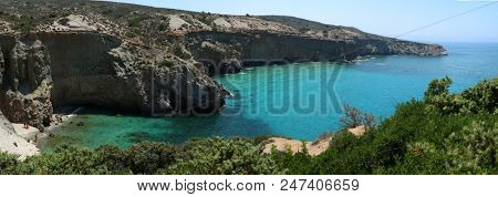 Beautiful turquoise water at Tsigrado beach in Milos island in Greece