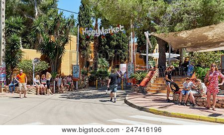 Ibiza Island, Spain - May 2, 2018: People Near The Entrance Of The Hippy Market. This Market Is Stuf