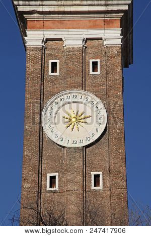 Clock With Golden Sun Dial At Tower In Venice
