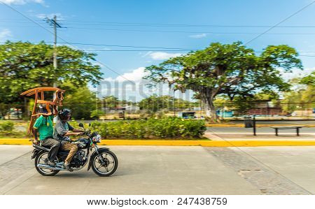 Leon, Nicaragua. February 2018. A View Of A Chair Being Carried On A Motor Cycle In Leon Nicaragua
