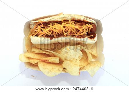 Hot Dog with Chili con carnie and cheese. Isolated on white. Room for text. Chili Dog. Chili Cheese Hotdog. 