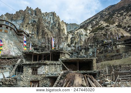 Old Stone Houses On The Background Of Rocky Mountains In The Village  Brak, Nepal.