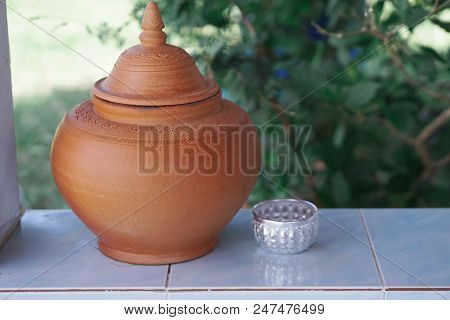 Pottery Container For Drinking Water. And A Container To Draw Water To Drink.