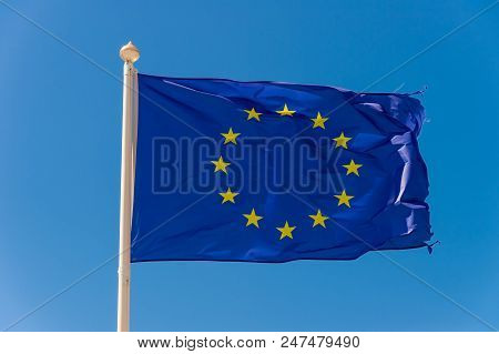 European Flag Waving Against Blue Sky In Wimereux, France.
