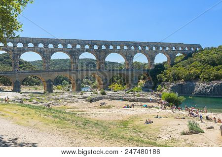 Remoulins,france-august 12, 2016: People Pont Du Gard Roman Aqueduct