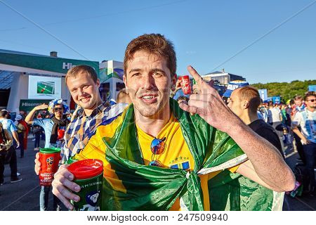 St. Petersburg, Russia - June 25, 2018: Supporter Of Brazilian National Football Team, Dressed In Cl