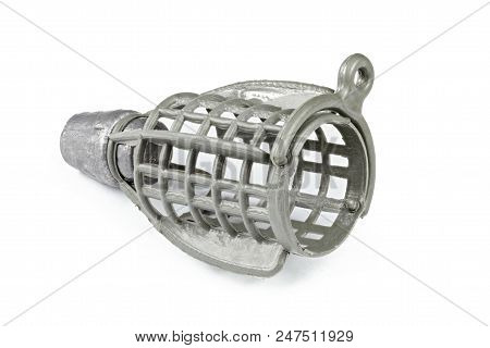 Brown Feeder Fishing Flat On An Isolated Background. Fishing Tackle Made With Plastic
