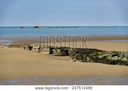 Arromanches - April 6: The Remains Of The Mulberry From Wwii D-day Harbor On April 6, 2016 In Arroma