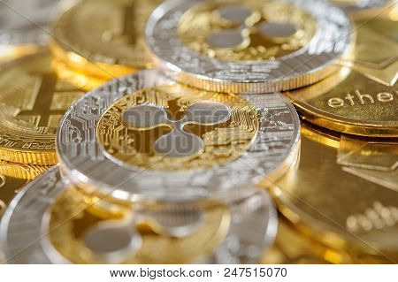 Golden Coins And Silver Coins. Ripple Bitcoin, Etherum On One Heap.