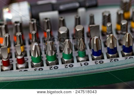 A Number Of Attachments To The Screwdriver, Close-up.