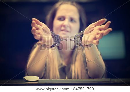 Arrested Woman Handcuffed Hands. Close-up Of Office Worker, Prisoner Or Arrested Terrorist, Hacker, 