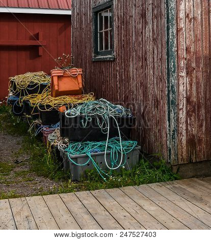 Lobster Fishing Equipment Stored By A Weathered Shack In The Village Of Rustico , Prince Edward Isla