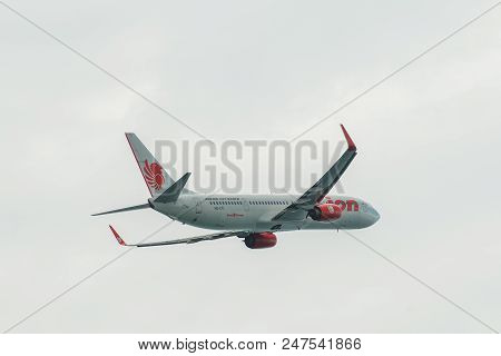 Passenger Airplane Flying In The Sky