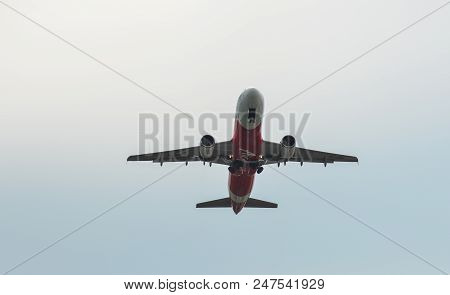 Passenger Airplane Flying In The Sky