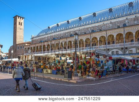Padua, Italy - March 21, 2013:  The Della Ragione Palace Seen From Della Frutta Square With A Tradit