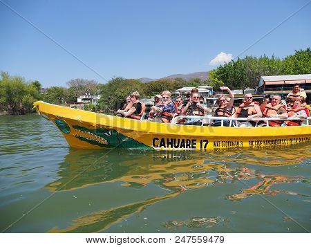 Tuxtla, Mexico North America On February 2018: Yellow Motor Boat And Group Of Tourists, Grijalva Riv