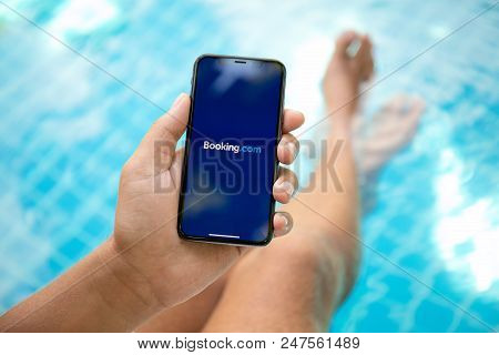 Koh Samui, Thailand - March 22, 2018: Man Hand Holding Iphone X With Application Booking.com Online 