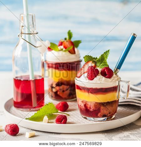 Fruit Cake, Jelly, Custard, Berry And White Cocolate Whipped Cream Individual Trifles, Square