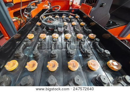 Powerful Rechargeable Battery Forklift. Contacts Of Electrolytic Cans Are Connected By Crosspieces.